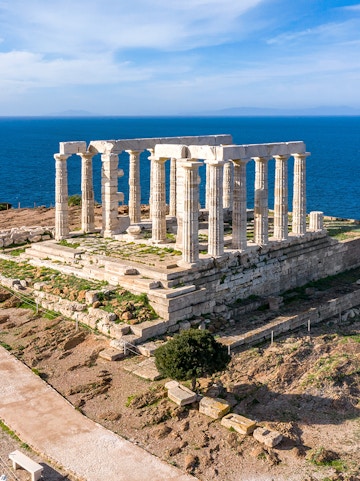 Temple of Poseidon at Cape Sounion overlooking the Aegean Sea, part of Athens tours.