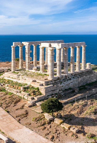 Temple of Poseidon at Cape Sounion overlooking the Aegean Sea, part of Athens tours.