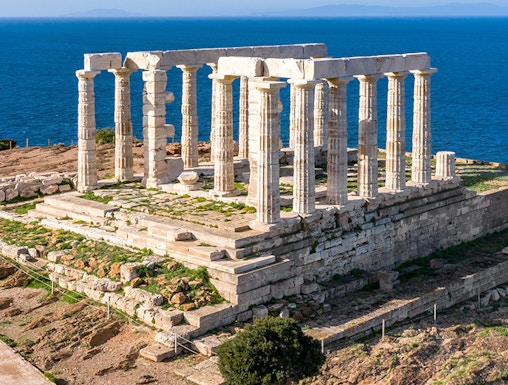 Temple of Poseidon at Cape Sounion overlooking the Aegean Sea, part of Athens tours.