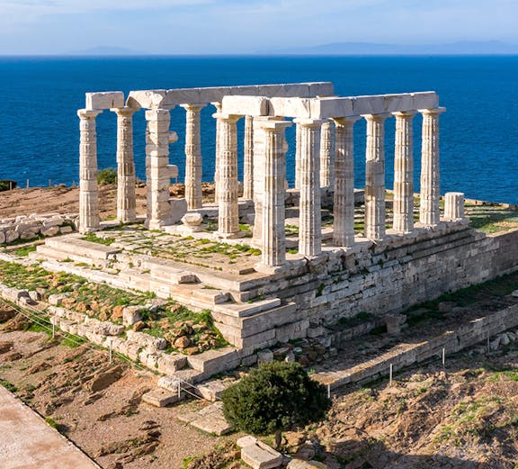 Temple of Poseidon at Cape Sounion overlooking the Aegean Sea, part of Athens tours.