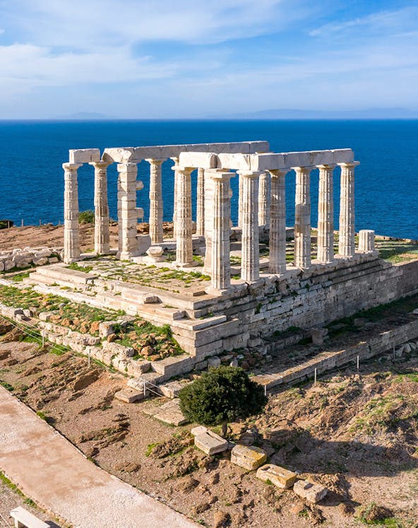 Temple of Poseidon at Cape Sounion overlooking the Aegean Sea, part of Athens tours.