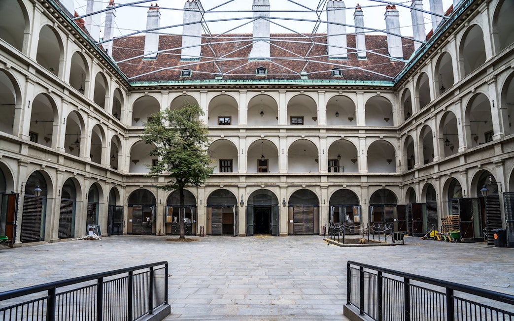Stallburg Imperial Stables courtyard with arched galleries in Vienna.