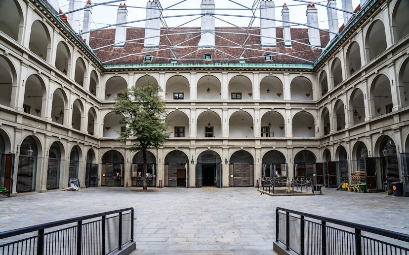 Stallburg Imperial Stables courtyard with arched galleries in Vienna.