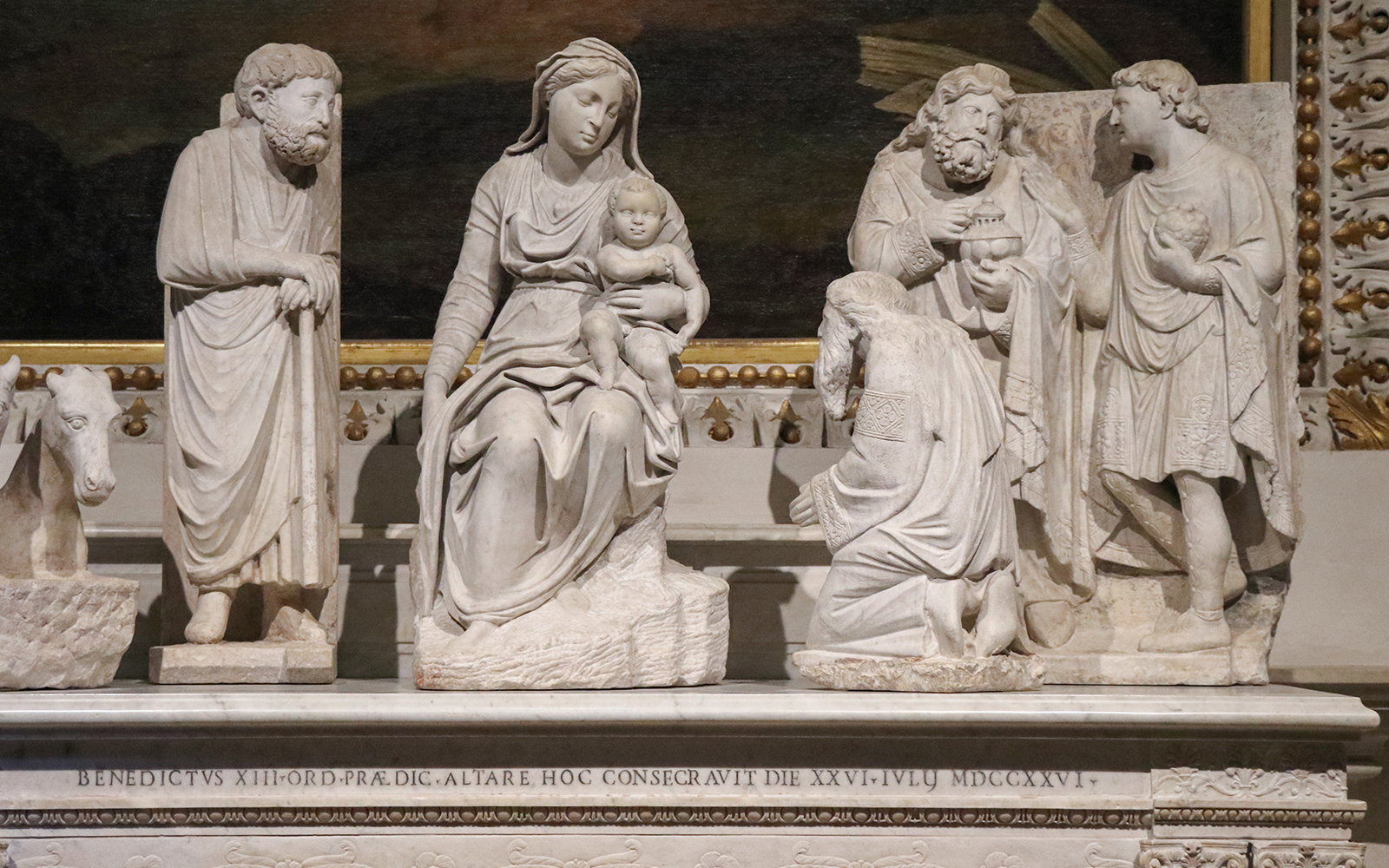 Sculpted Nativity Scene at Basilica Santa Maria Maggiore, Rome, featuring Mary and baby Jesus.