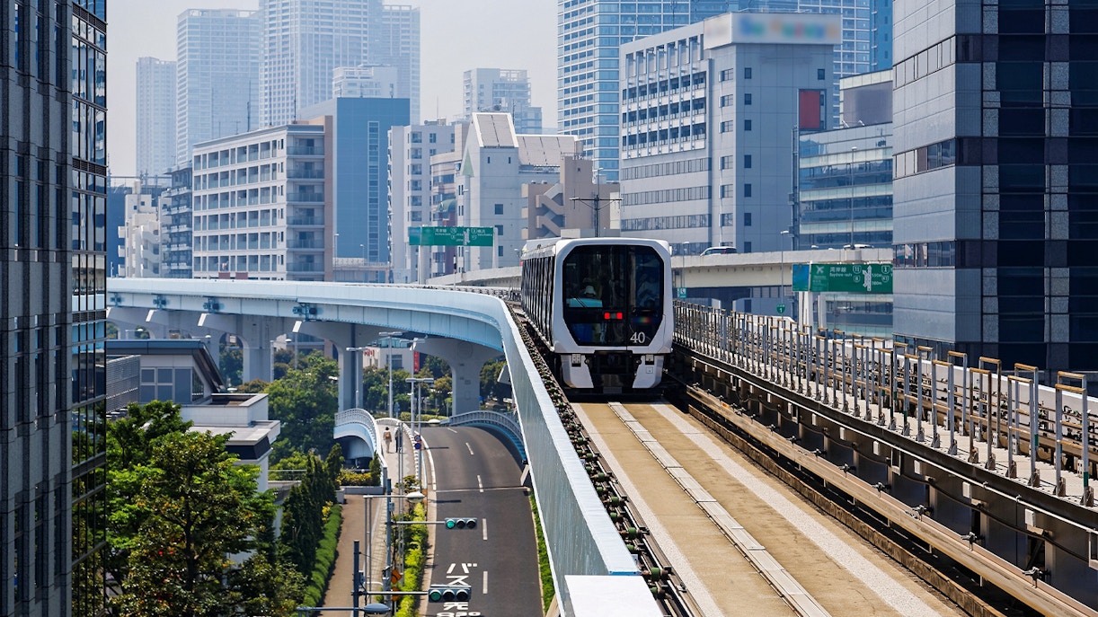 Tokyo metro train arriving at a station platform, showcasing public transport in Tokyo.