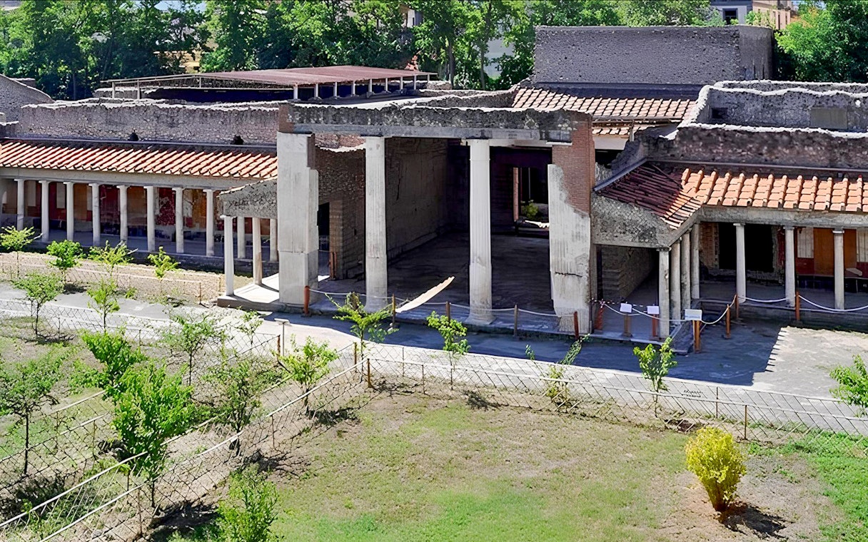 Ancient ruins of Oplontis villa with columns and courtyard, part of Pompeii and Oplontis small group tour.