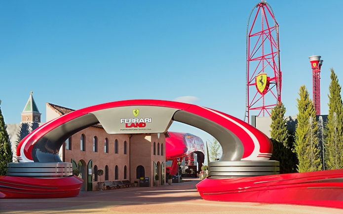 Ferrari Land entrance with roller coaster in PortAventura, Spain.