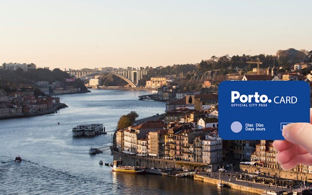 Porto cityscape with Douro River and Porto.CARD in foreground.