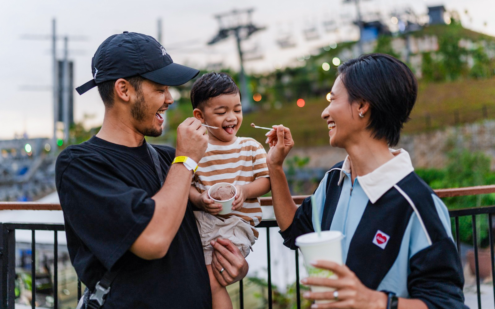 Family enjoying ice cream at Skyline Luge Kuala Lumpur.