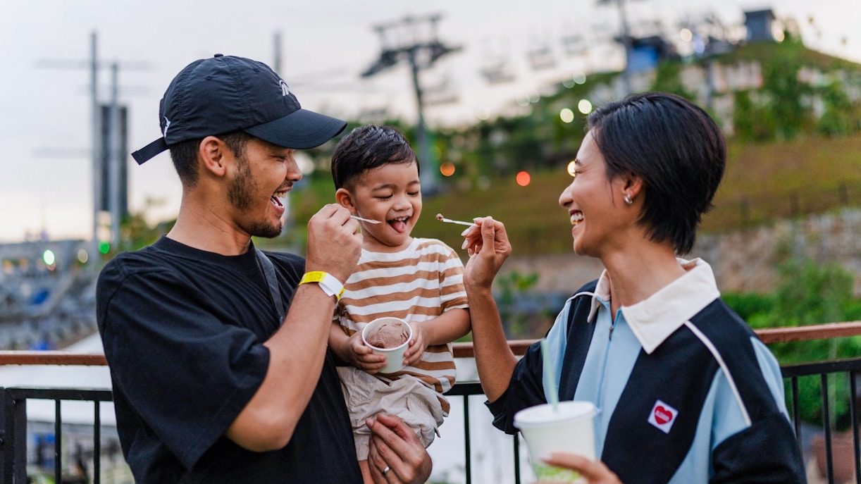 Family enjoying ice cream at Skyline Luge Kuala Lumpur.