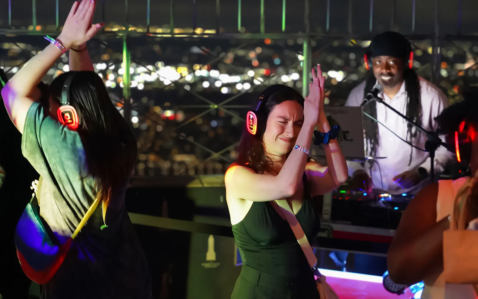 Silent disco with DJ at Empire State Building Observation Deck, New York City.