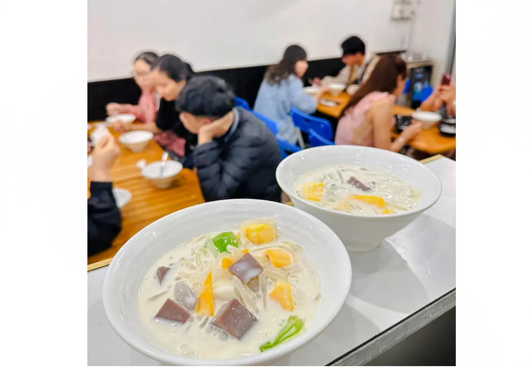 Bowls of Vietnamese dessert soup served at a local eatery during Da Nang street food tour.