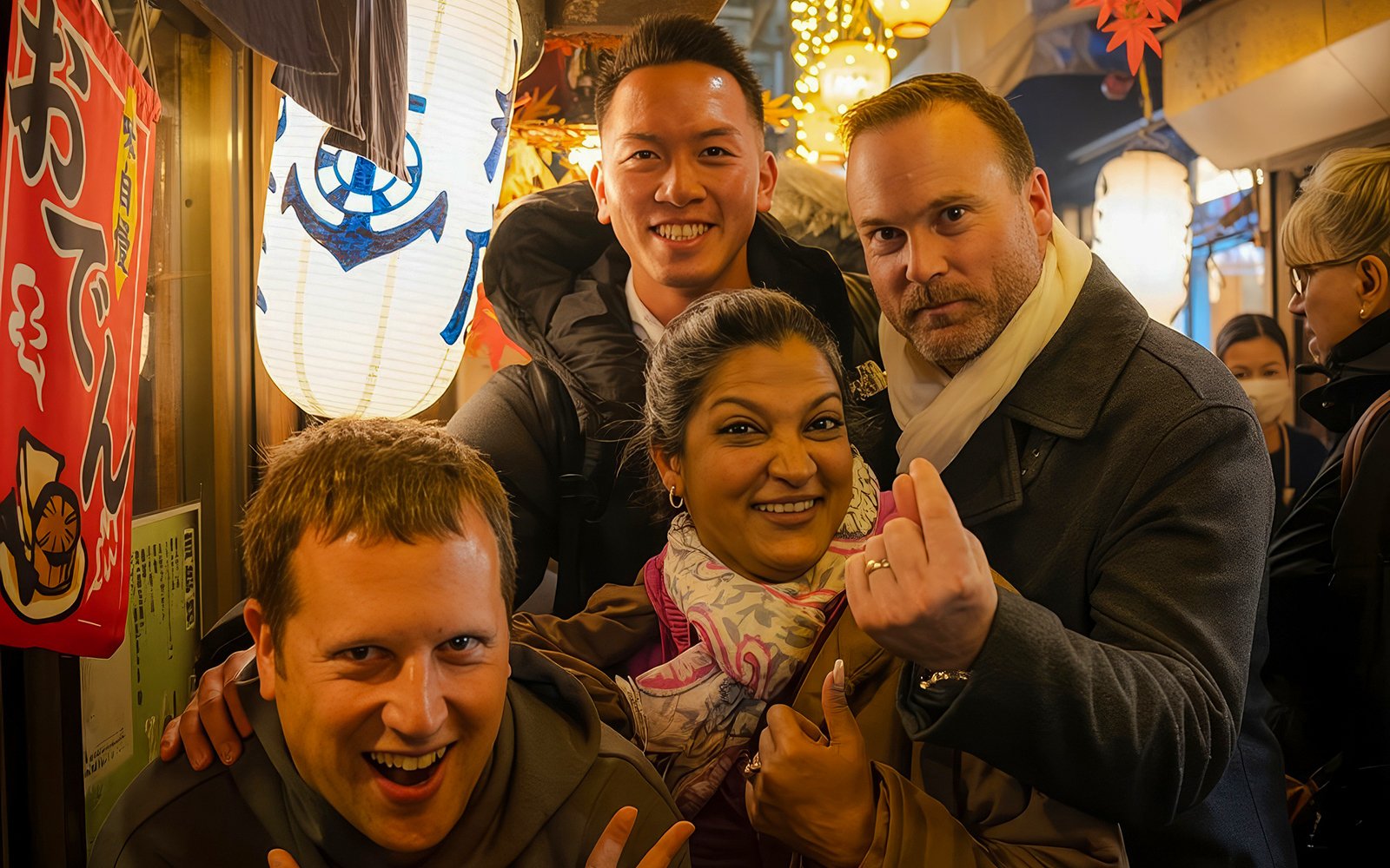 Group enjoying Shinjuku bar and izakaya crawl in Tokyo.