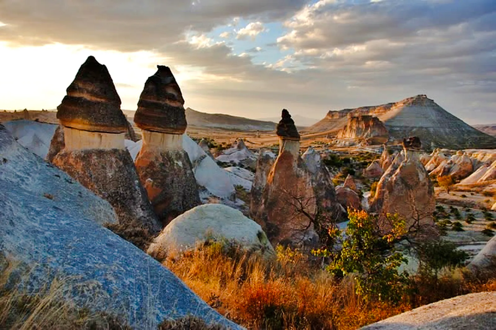Fairy chimneys at sunset in Cappadocia, part of the Red Tour experience.