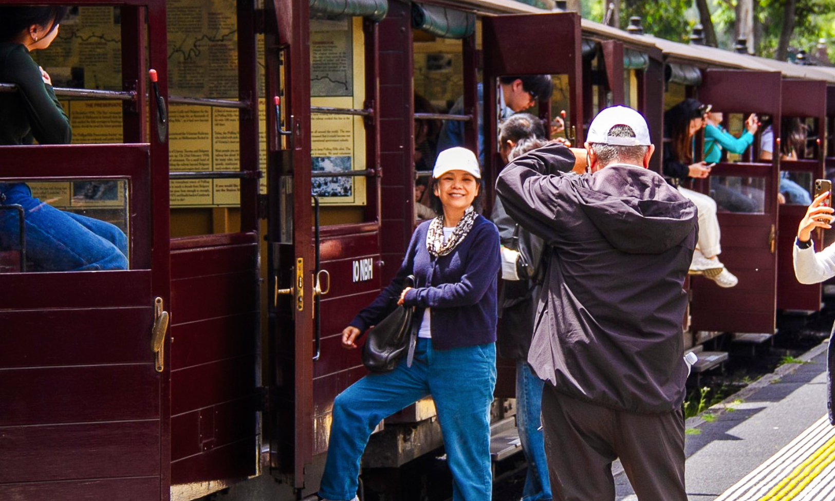 Passengers boarding Puffing Billy steam train vintage carriage near Melbourne station.