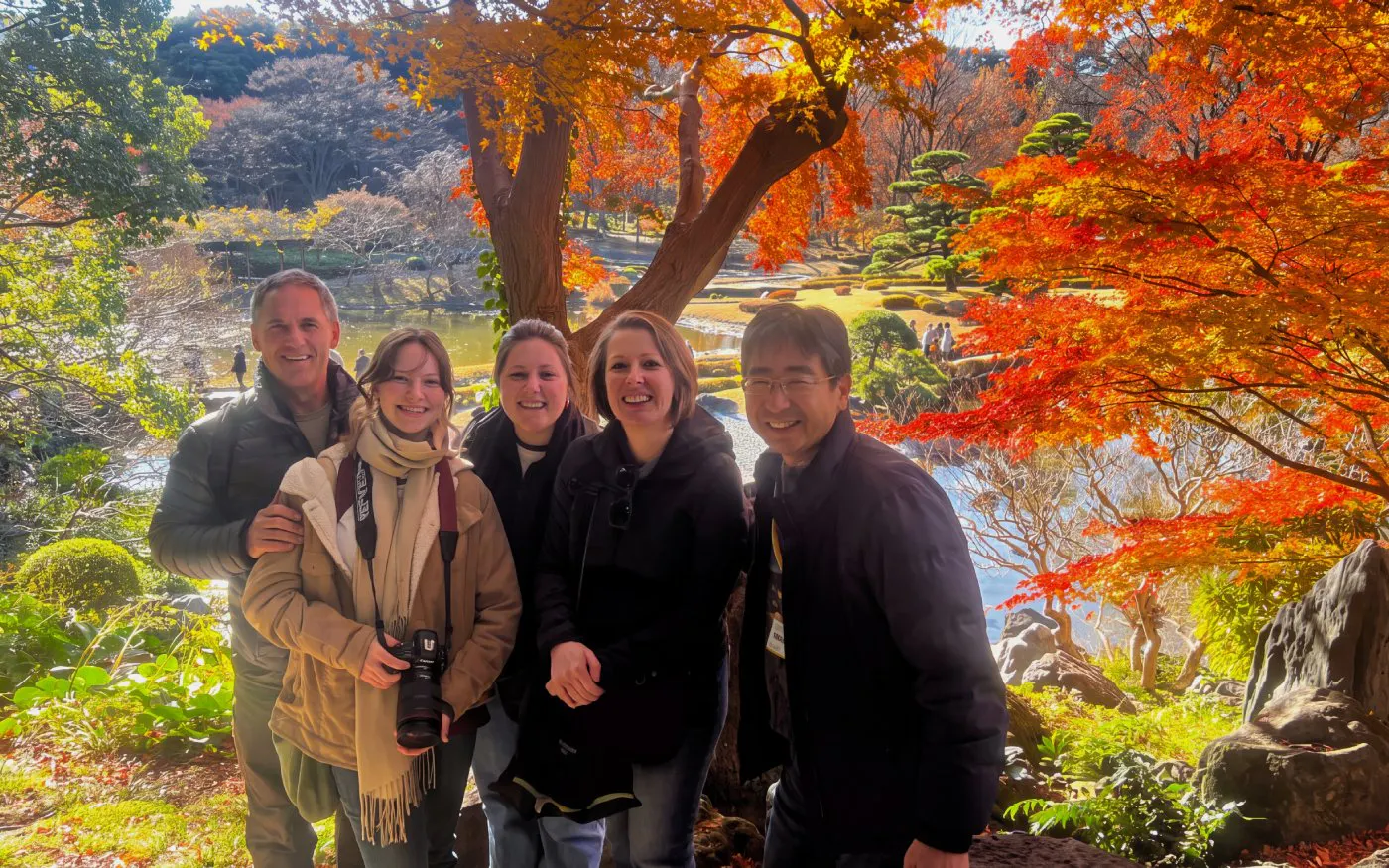 Group enjoying autumn foliage at East Gardens, Chiyoda, Tokyo.
