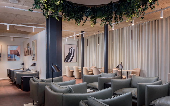 Aspire Lounge seating area with modern decor at Copenhagen Kastrup Airport Terminal 2.