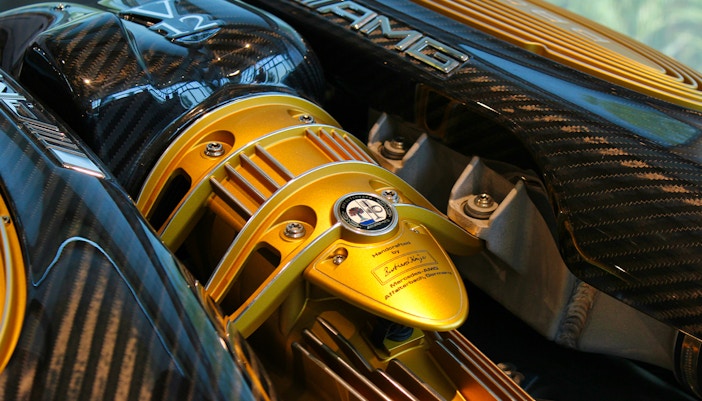 Pagani Factory & Museum tour showcasing a detailed view of a Pagani engine component.