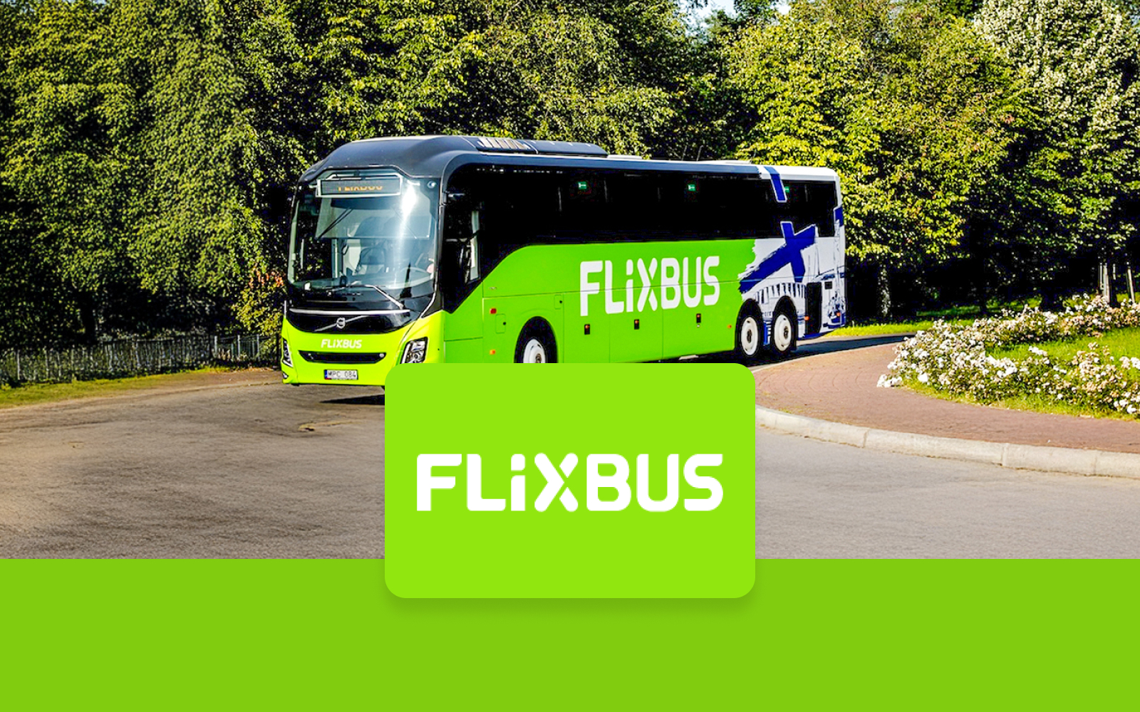 FlixBus traveling to Efteling from Amsterdam on a scenic road.
