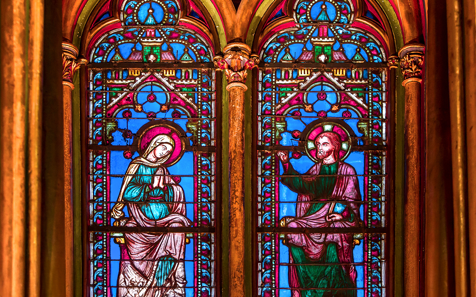 South side of the rose window at Sainte-Chapelle, Paris, showcasing intricate stained glass artistry.
