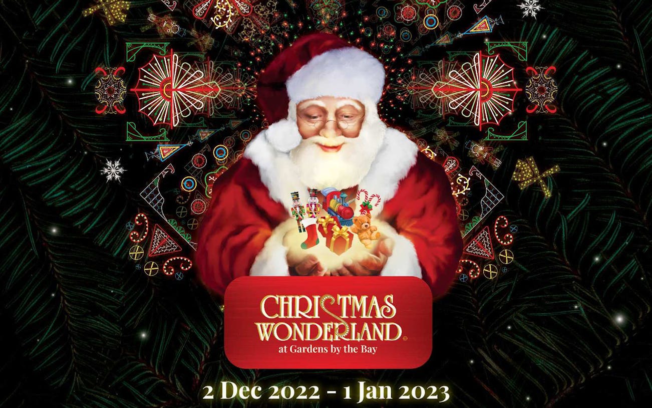 Santa holding Christmas toys at Gardens by the Bay's Christmas Wonderland 2022 event.
