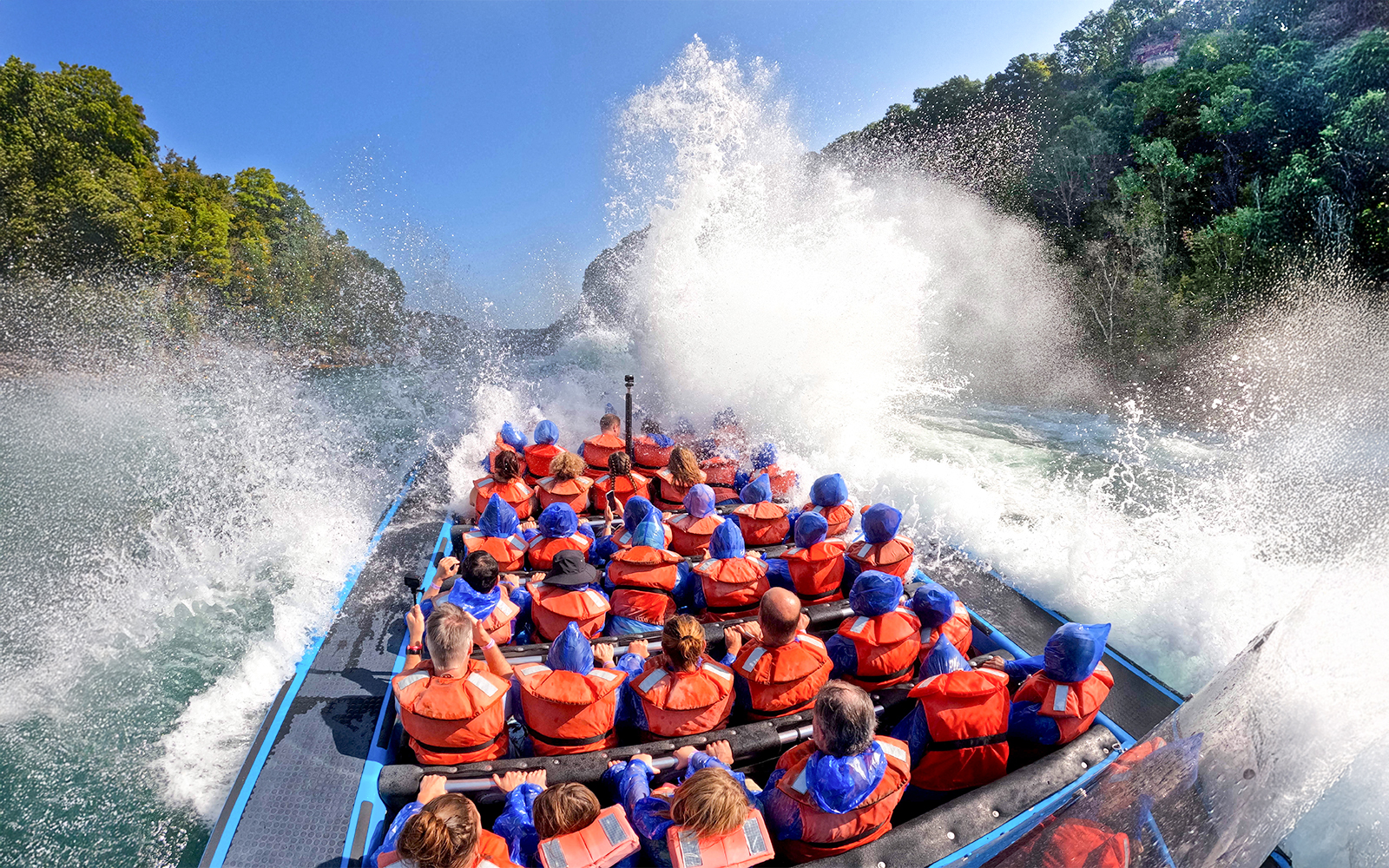 Guests on Whirlpool Jet Boat Tour during a fun experience in the Niagara Gorge in Niagara, Canada