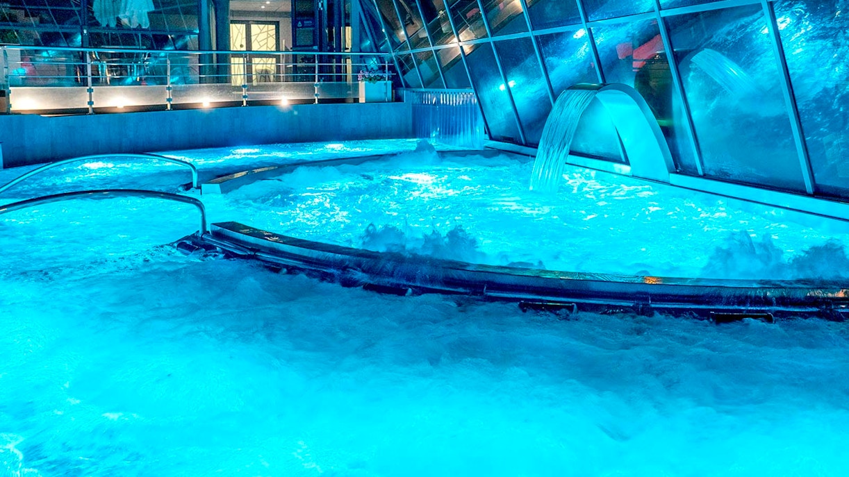 Caldea spa thermal pools with mountain views in Andorra, premium entry experience.