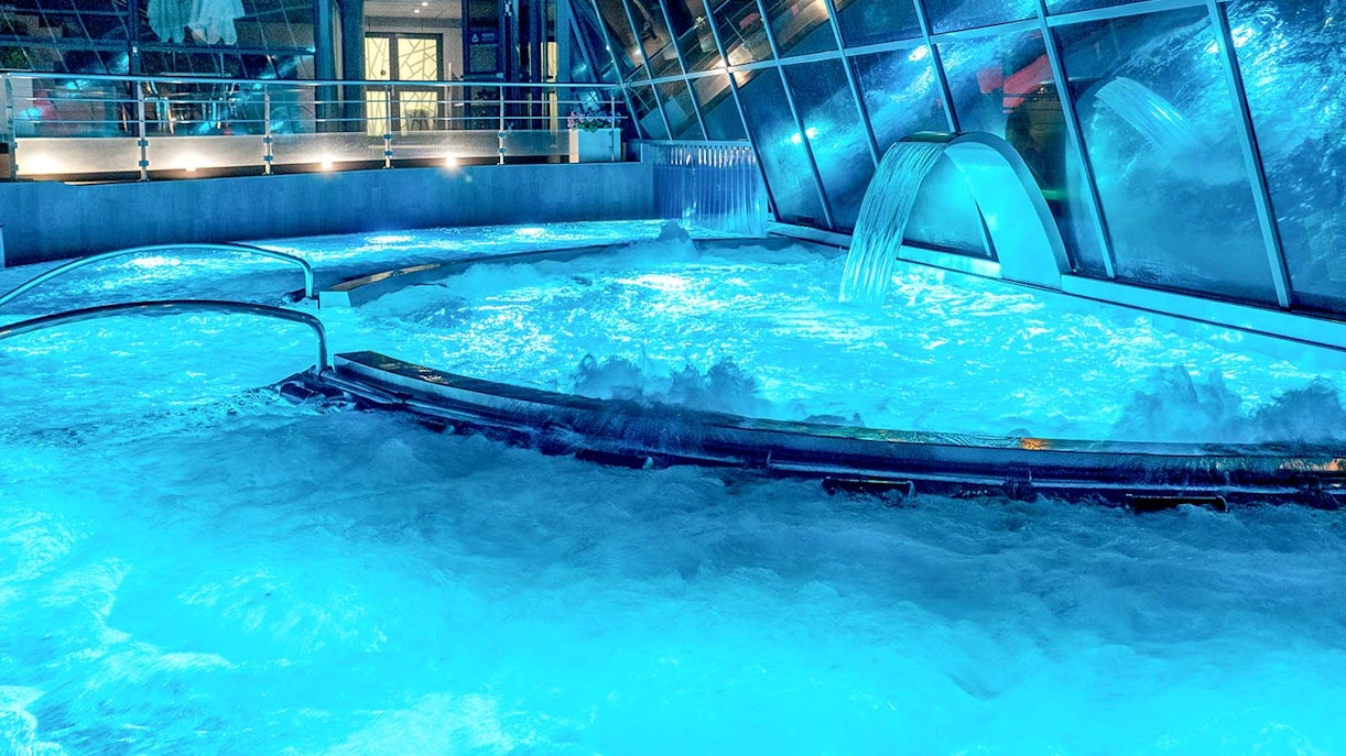 Caldea spa thermal pools with mountain views in Andorra, premium entry experience.