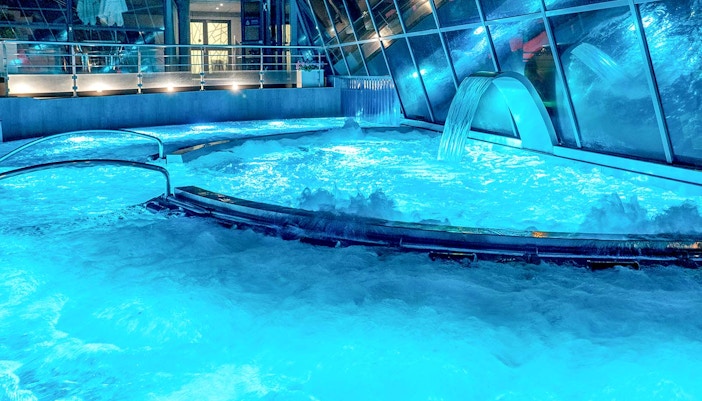 Caldea spa thermal pools with mountain views in Andorra, premium entry experience.