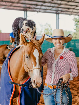 Person with horse and dog at Katherine Outback Experience
