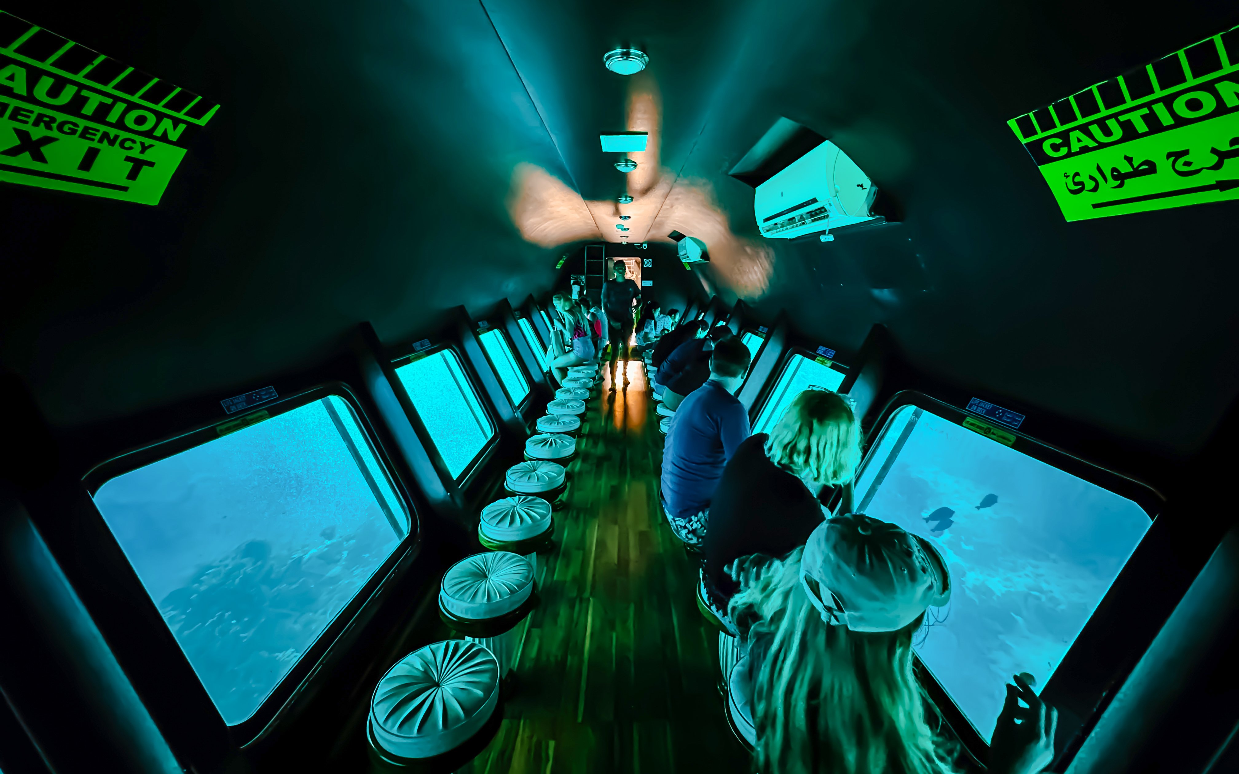 People viewing fish through windows on Royal Seascope Submarine, Hurghada.