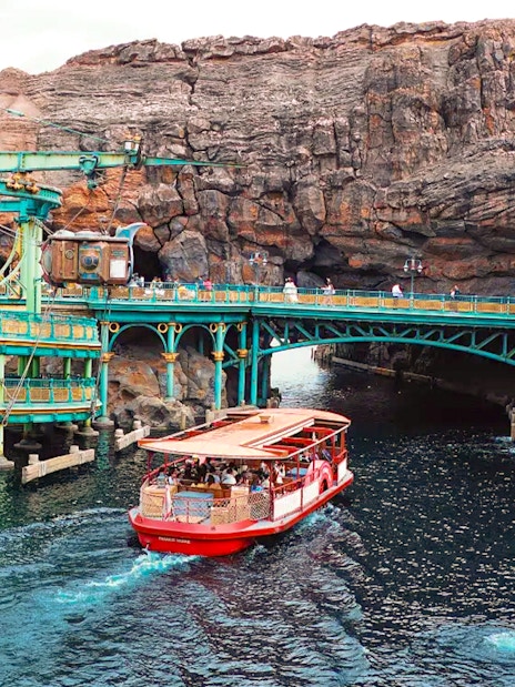 Boat ride at Mysterious Island in Tokyo Disneyland with rocky backdrop.
