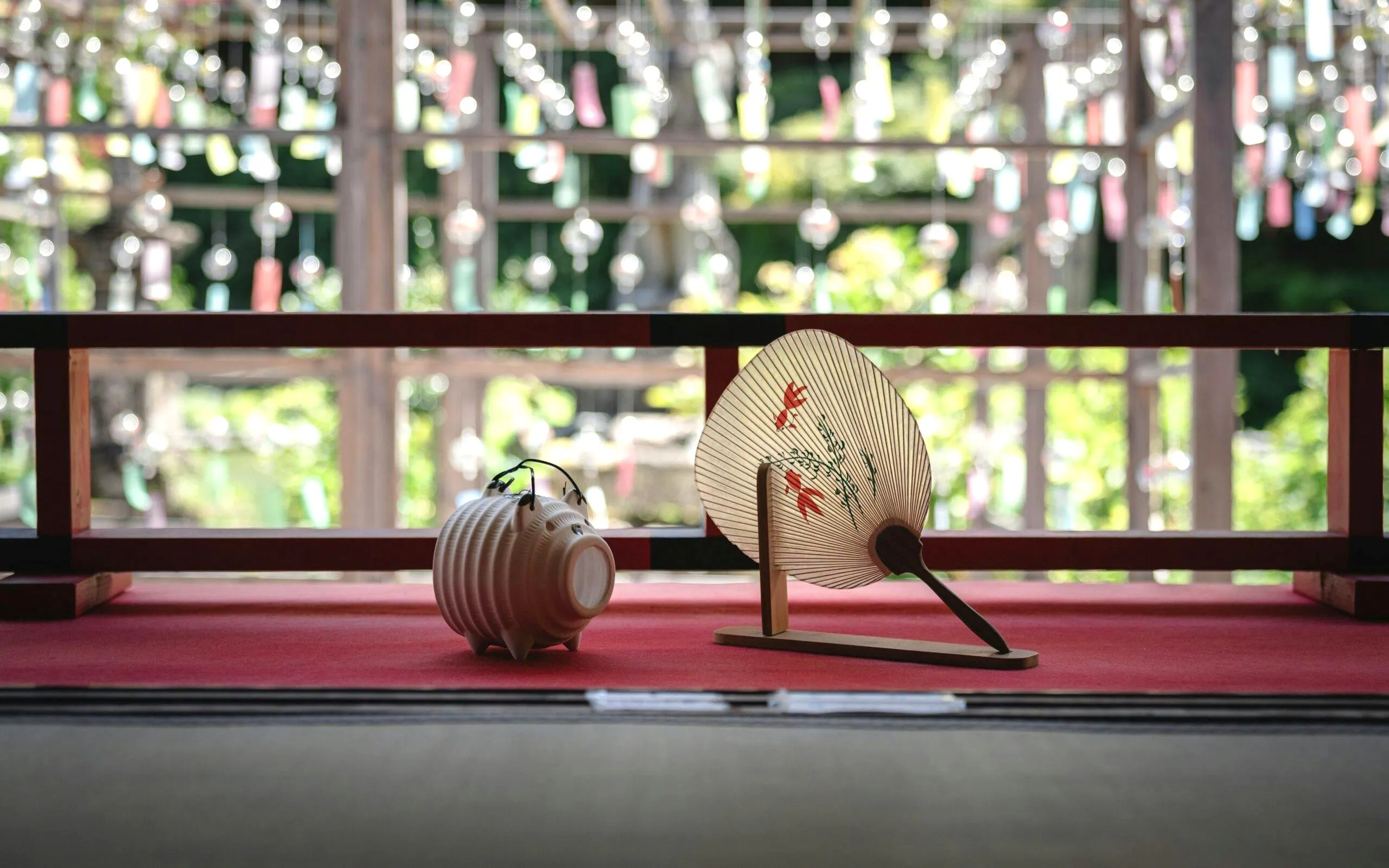 Wind chimes and traditional fan at Kyoto Summer Limited Wind Chime Festival.