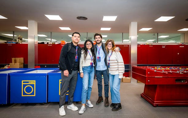 Group of visitors in exclusive team area during Barça Museum & J. Cruyff Stadium tour.