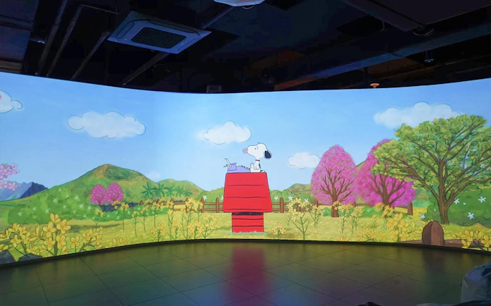Snoopy on red doghouse in colorful garden at Snoopy Garden Jeju.