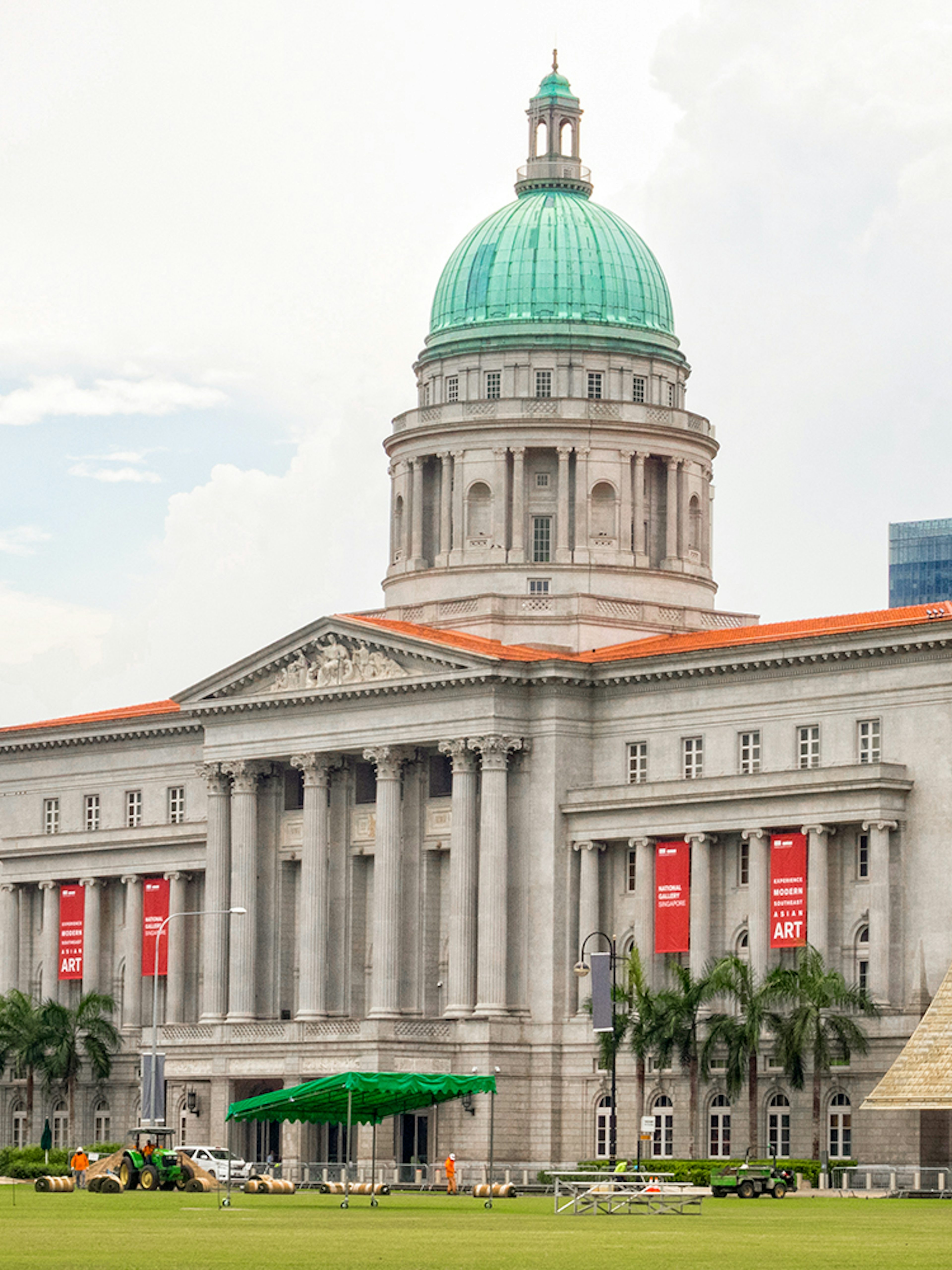National Gallery Singapore exterior with dome and banners.
