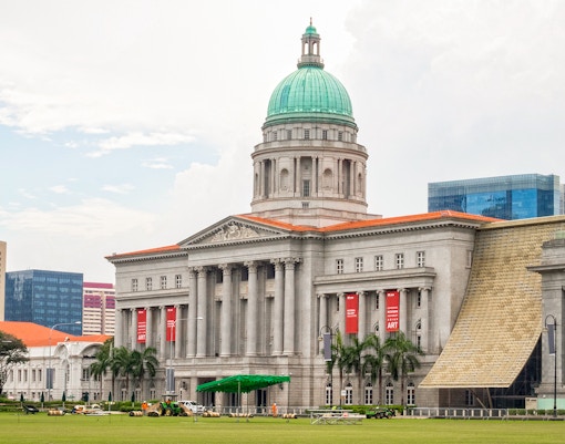 Visitors exploring art exhibits at the National Gallery Singapore.