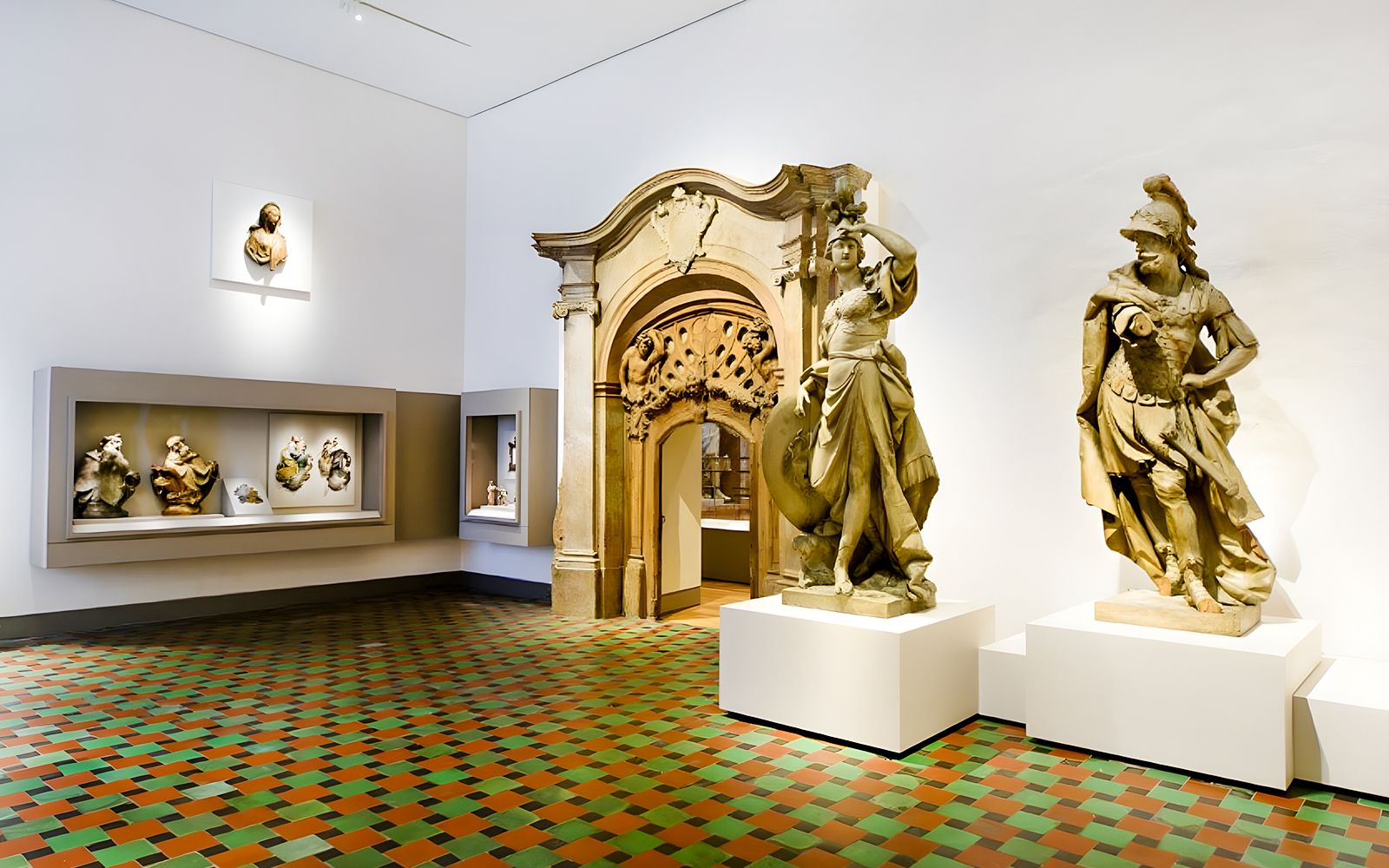 Statues and sculptures in a Munich museum exhibit, included with Munich City Pass.
