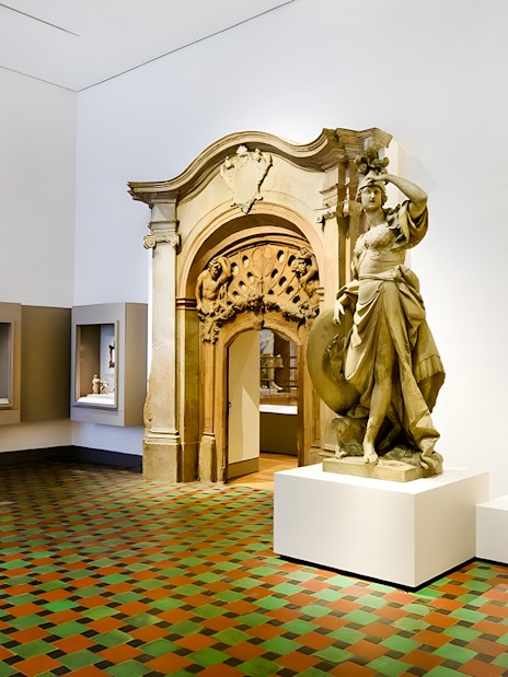 Statues and sculptures in a Munich museum exhibit, included with Munich City Pass.
