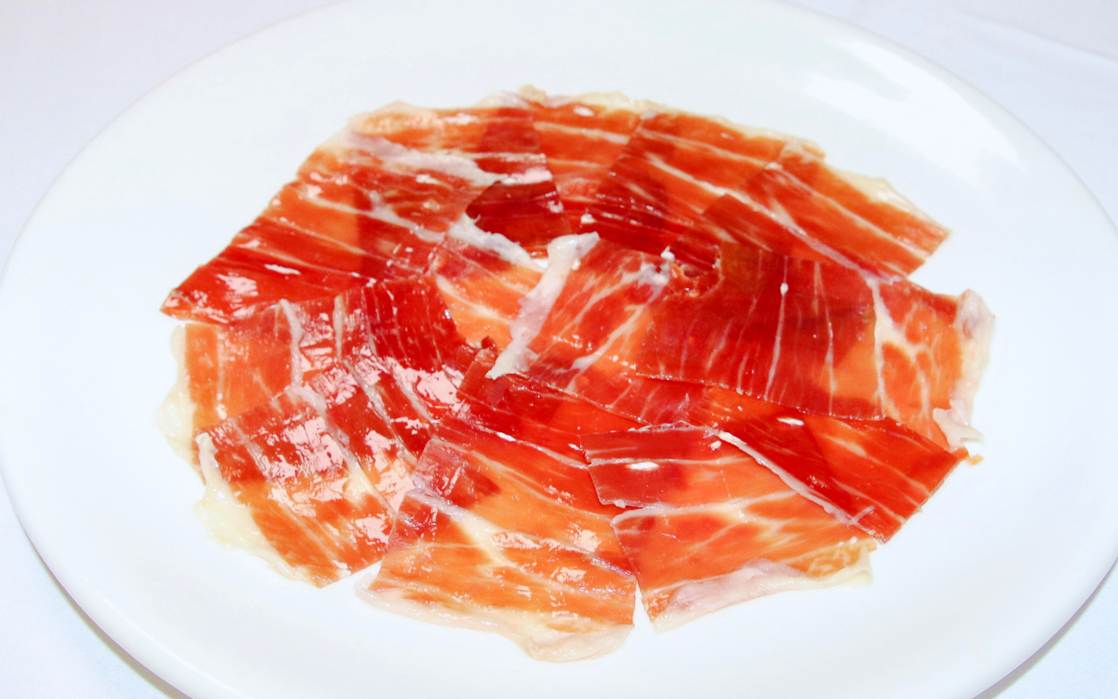 Jamón ibérico on a plate at Tablao La Cantaora, Seville.