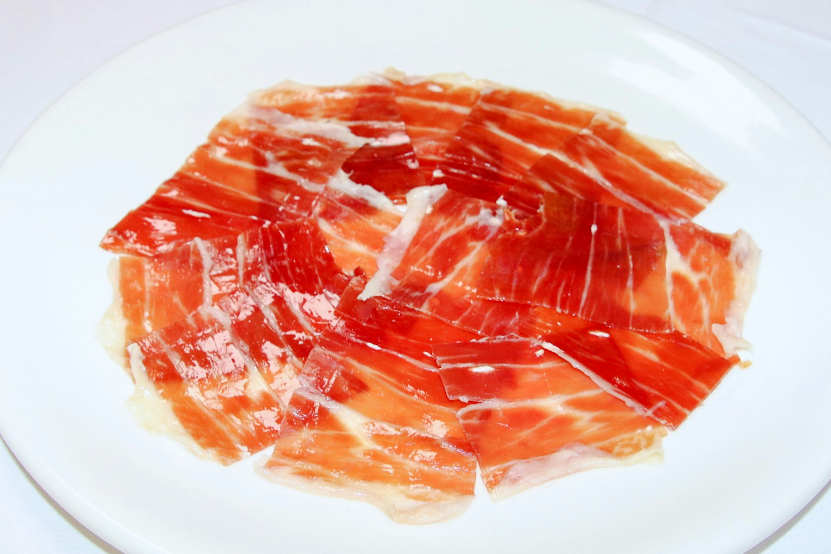 Jamón ibérico on a plate at Tablao La Cantaora, Seville.