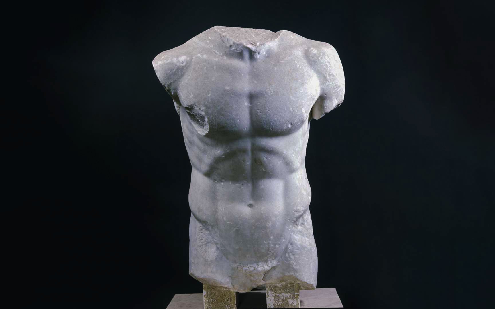 Roman marble torso of the Doryphoros on display.