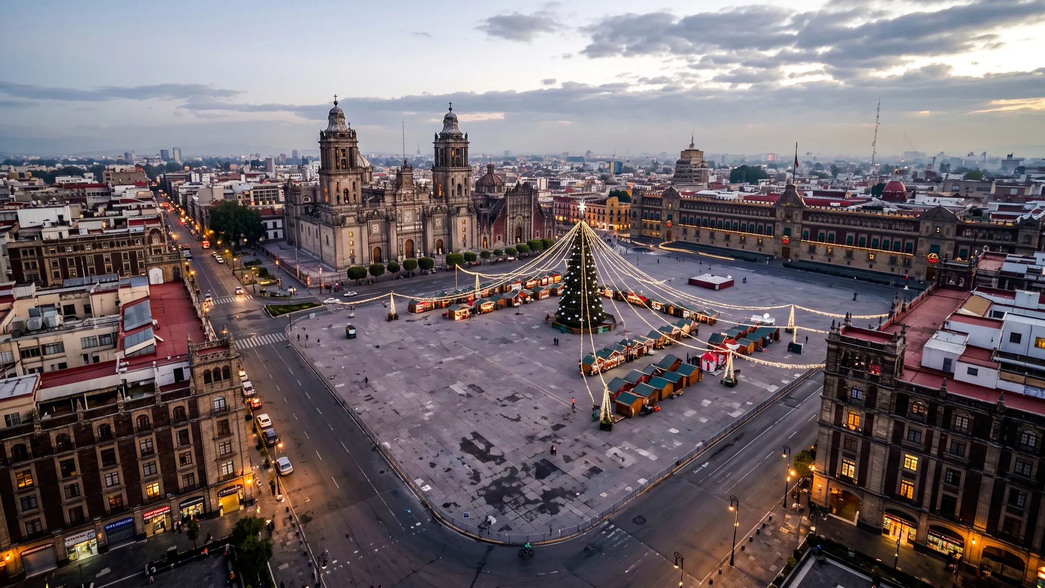 Zócalo square with festive decorations and Mexico City Metropolitan Cathedral, Mexico City.