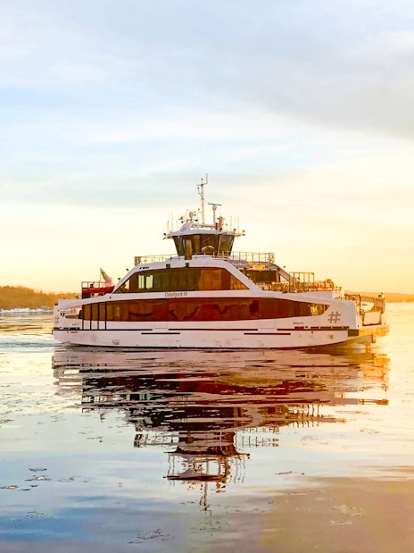 Ferry cruising during sunset on Oslo Fjord, Norway.