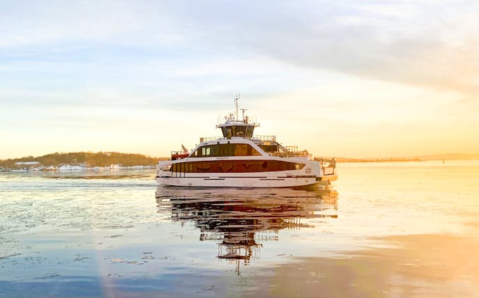 Ferry cruising during sunset on Oslo Fjord, Norway.