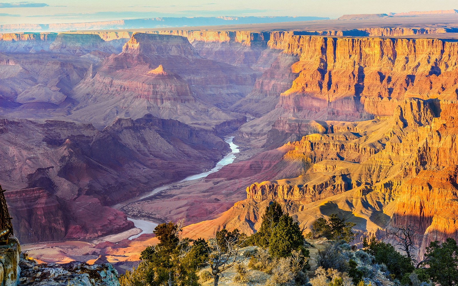 Aerial view of Grand Canyon West with river and rock formations, 20 min airplane tour.