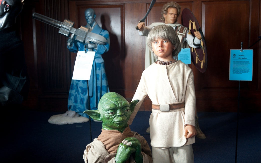 Wax figures of iconic movie characters at a Dublin museum exhibit.