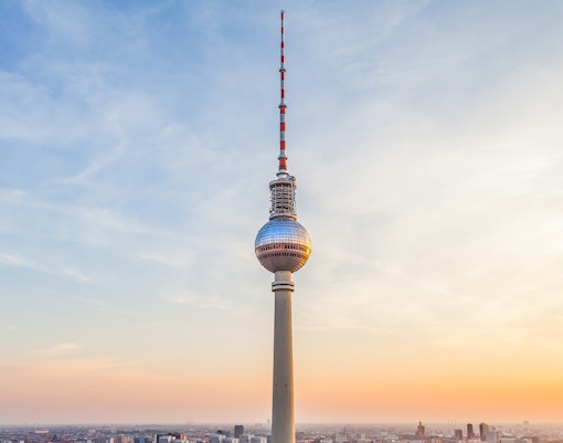 Berlin TV Tower with cityscape view in the background.