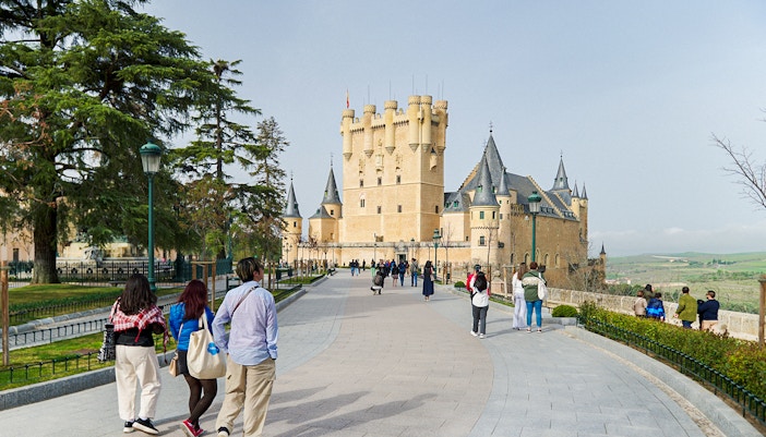 Segovia Alcazar castle with turrets and stone walls in Segovia, Spain.
