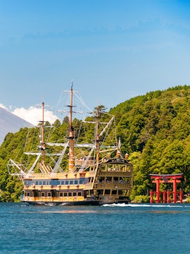Pirate ship on Lake Ashi with red torii gate, Hakone.
